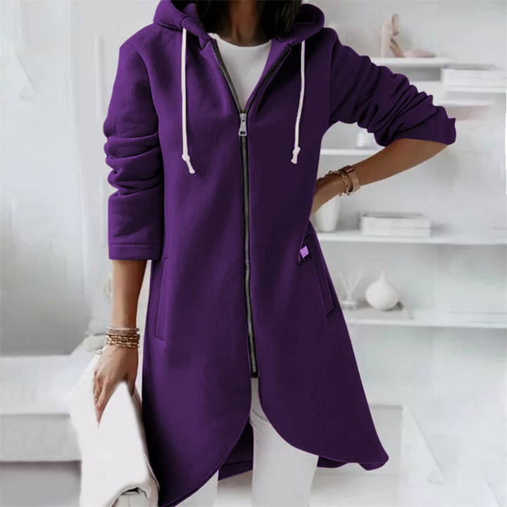 Chic women's hooded longline jacket, perfect for layering and adding a touch of modern style to your outfit.