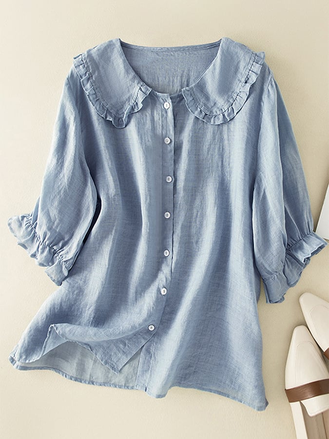 Women's stylish loose-fit ruffled neck shirt in a versatile chic design. Perfect for casual wear.