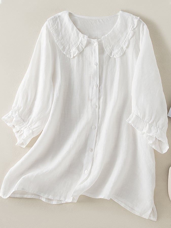 Chic women's loose blouse with ruffled Peter Pan collar. Stylish and comfortable for any occasion.
