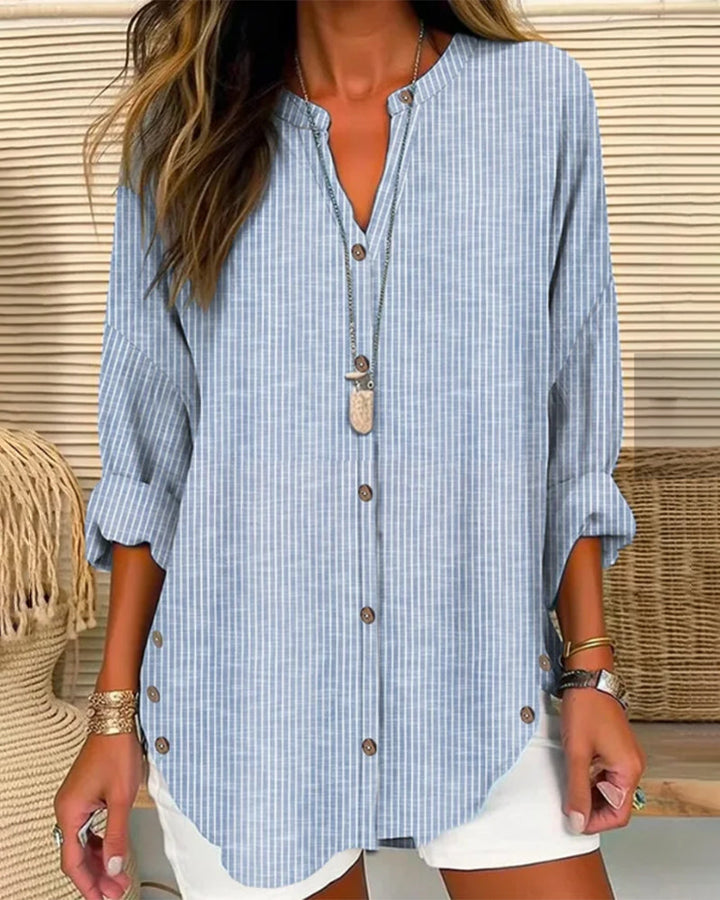 Women's stylish loose fit V-neck blouse with long sleeves, perfect for casual or office wear.