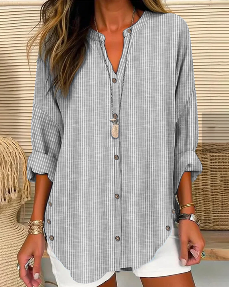 Fashionable women's long sleeve V-neck blouse, loose fit for everyday comfort & office elegance.