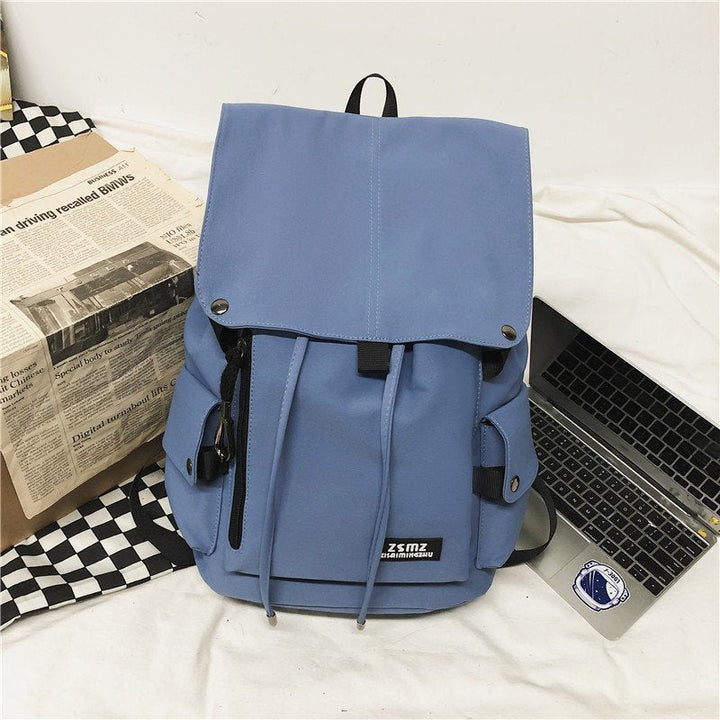 Chic women's everyday utility backpack, spacious and durable with multiple pockets for work, travel, or school.