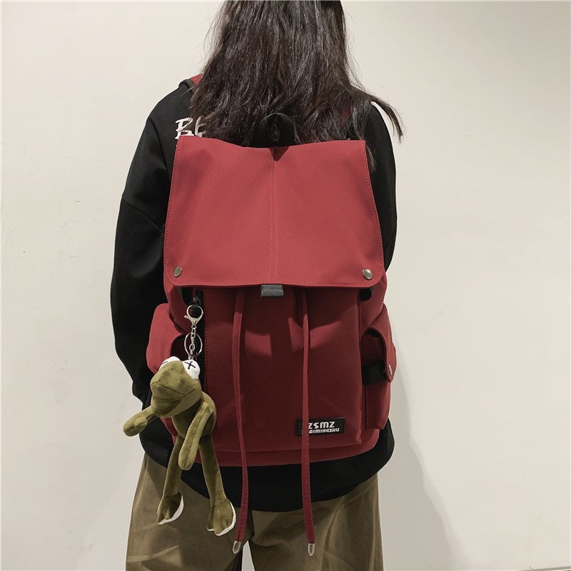 Women's commuter multi-pocket backpack, offering organized storage and durability for daily essentials.