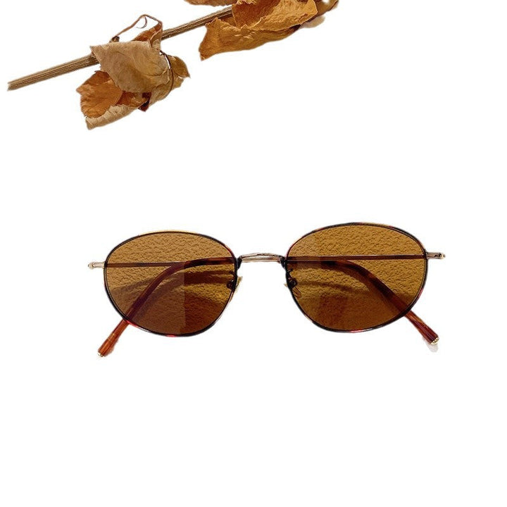 Stylish women's oval eyewear; elegant frames designed for comfort & comprehensive UV eye protection.