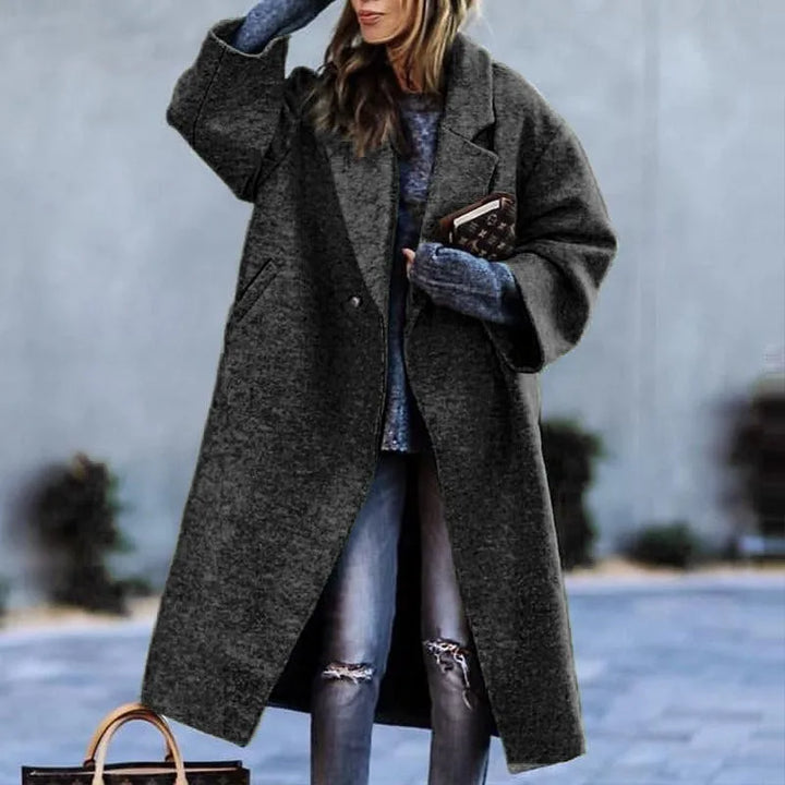 Fashionable women's oversized coat. Comfortable, versatile, & on-trend outerwear.
