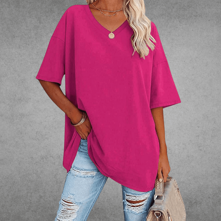 Comfortable women's oversized V-neck top, a stylish loose-fit shirt for everyday and summer fashion.