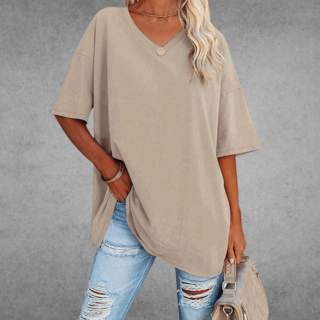 Spring fashion women's V-neck top, a stylish oversized t-shirt with a comfortable loose fit.