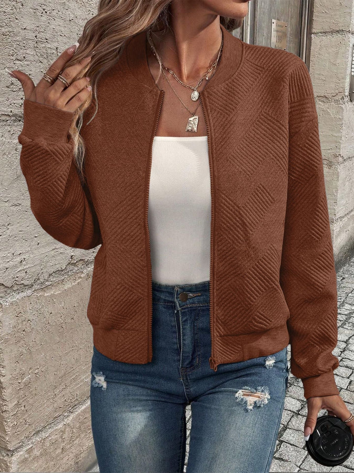 Soft women's patterned zip cardigan. A stylish, comfortable layering piece for any casual outfit.