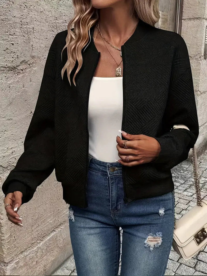 Stylish women's patterned front zip cardigan. A must-have casual wear layering piece.