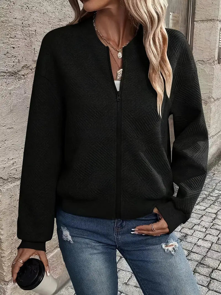 Versatile women's patterned zip cardigan, ideal for layering in fall & spring apparel.