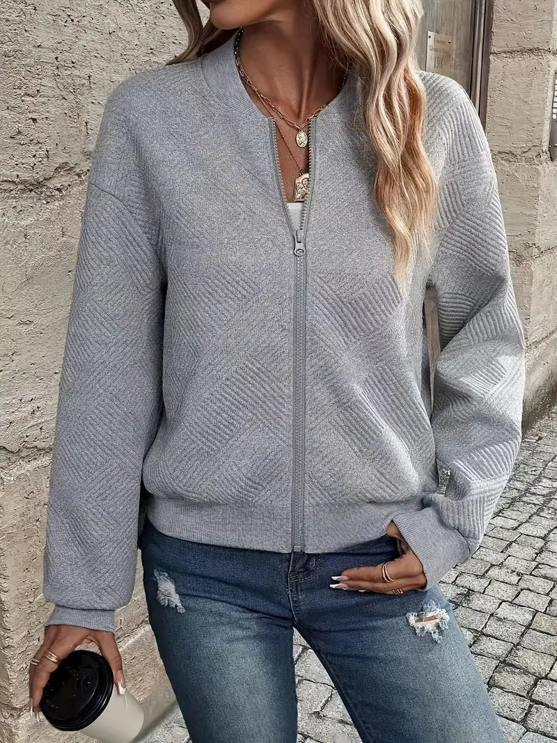 Trendy women's patterned zip-up cardigan. Effortless style & comfort for everyday fashion.