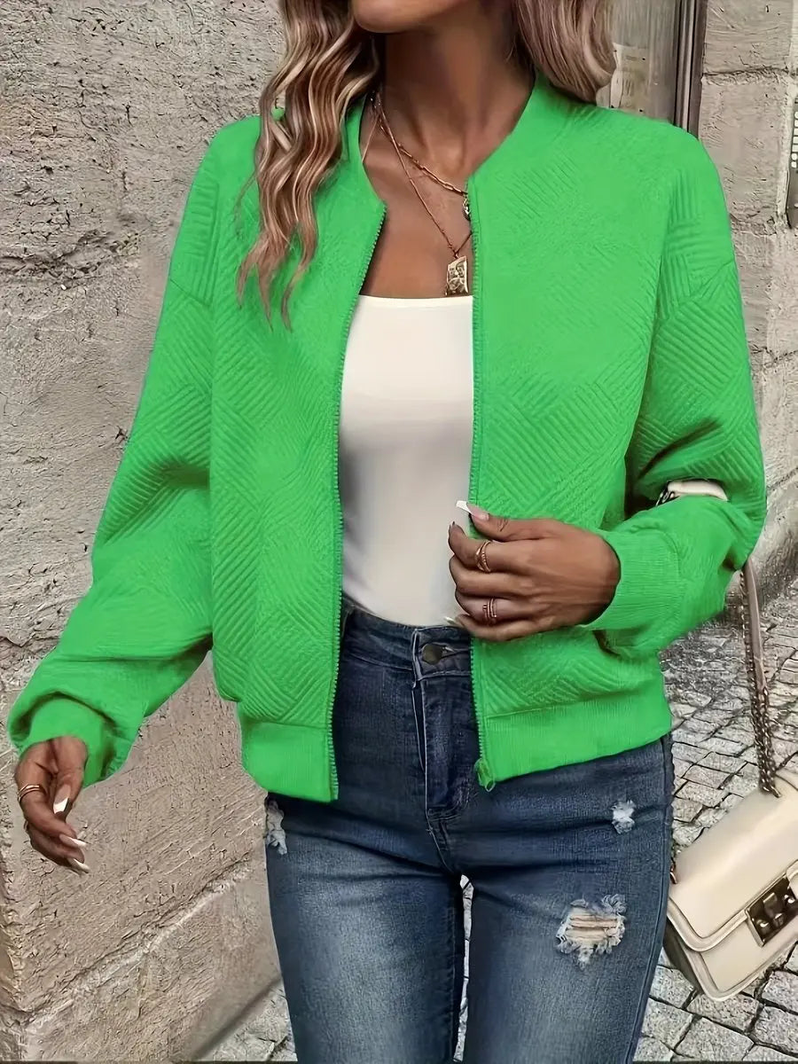 Stylish women's quilted bomber jacket. Cropped, comfy zip-up, great for casual spring wear.