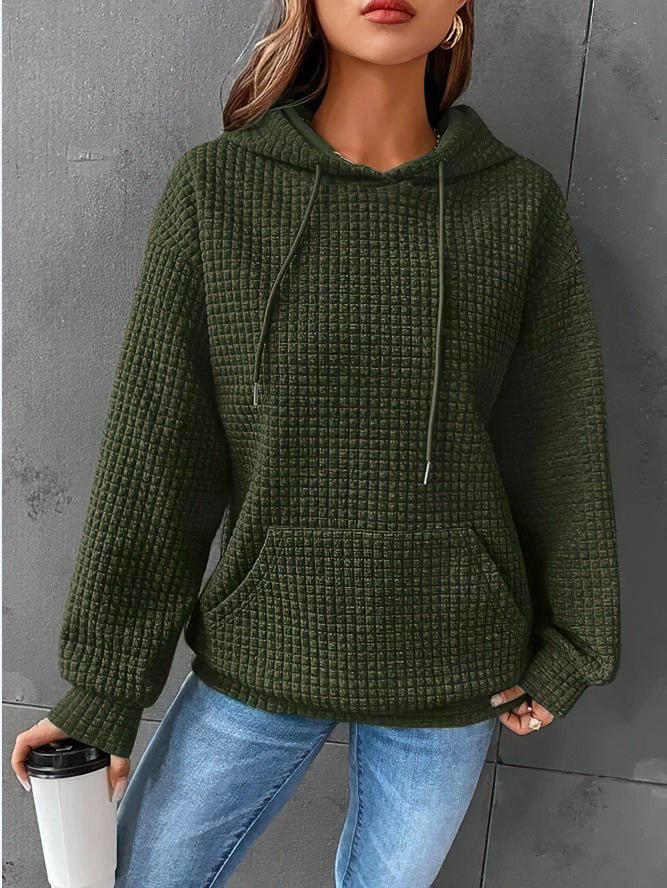 Elegant women's quilted hoodie. Comfy long-sleeve pullover, a stylish choice for chic everyday fashion.