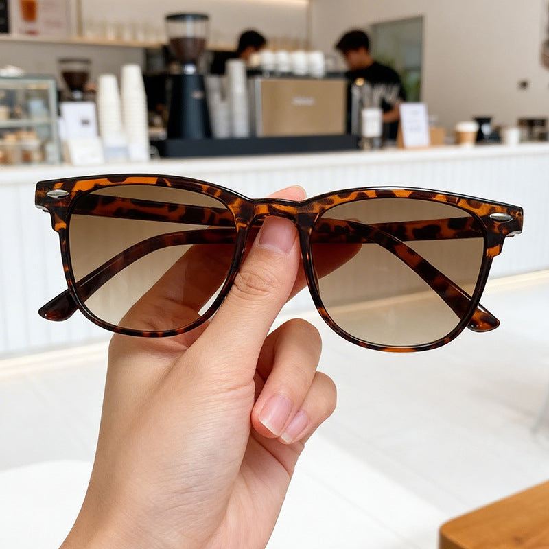 Women's stylish retro sunglasses with full UV protection. Perfect fashion eyewear accessory.