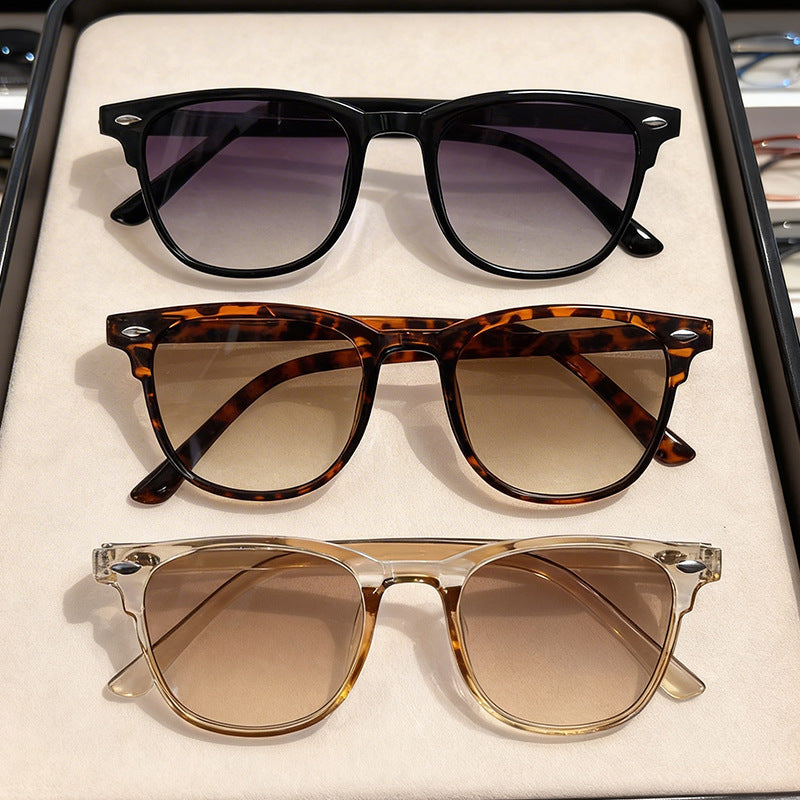 Classic black retro sunglasses for women. Stylish UV protection eyewear, an essential fashion accessory.