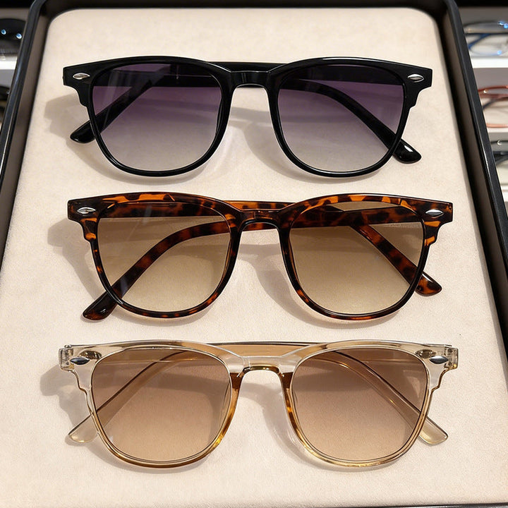 Classic black retro sunglasses for women. Stylish UV protection eyewear, an essential fashion accessory.
