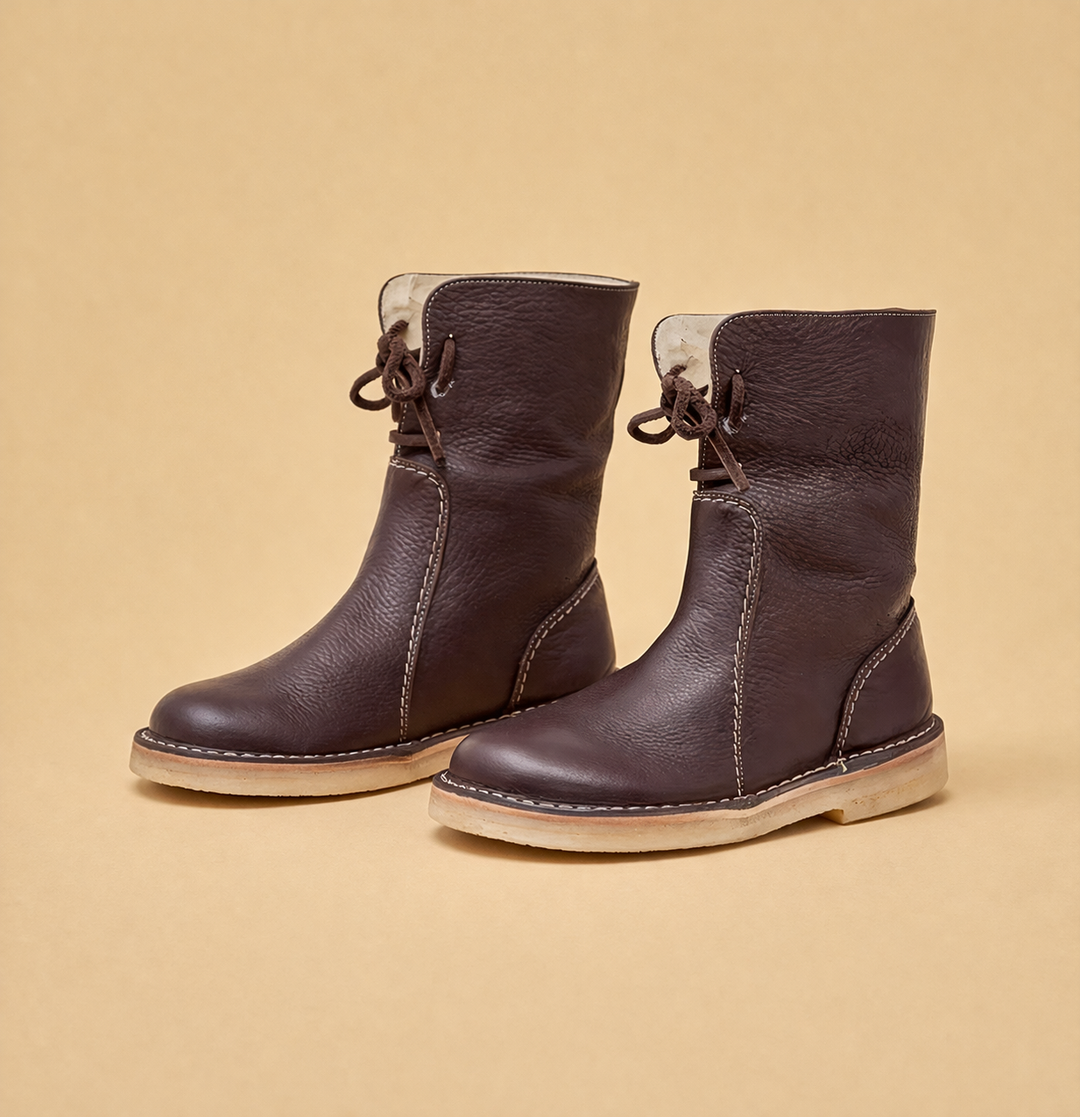 Protect your feet with warm women's short winter boots. Stylish, cozy & comfortable flat heel snow footwear for outdoors.