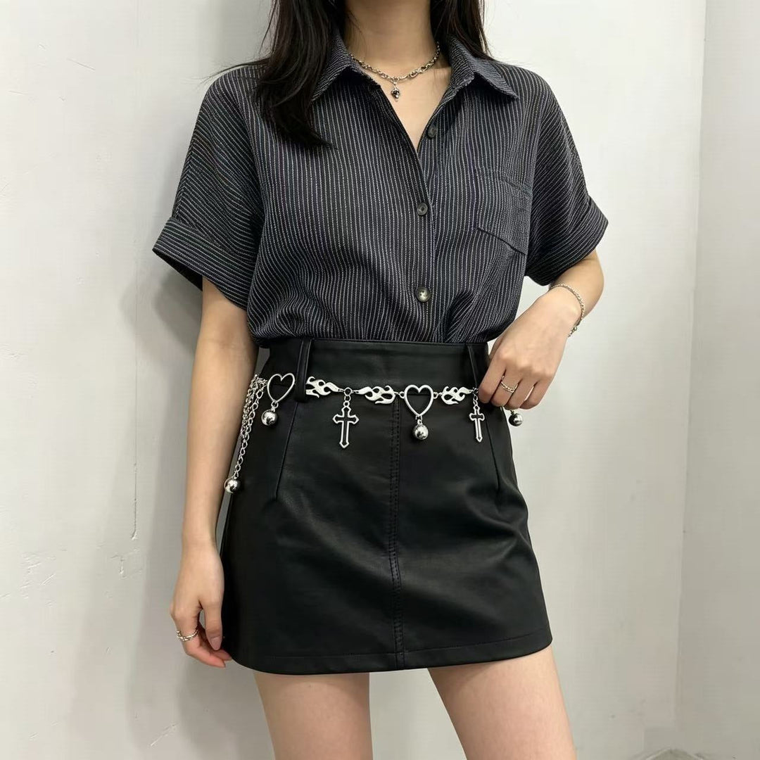 Women's stylish silver chain belt with heart & flame pendants, a trendy fashion accessory for waist or hip.