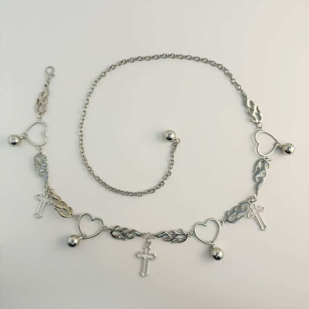 Fashionable women's chain belt with heart, flame, & cross pendants. Ideal trendy accessory for dresses or jeans.