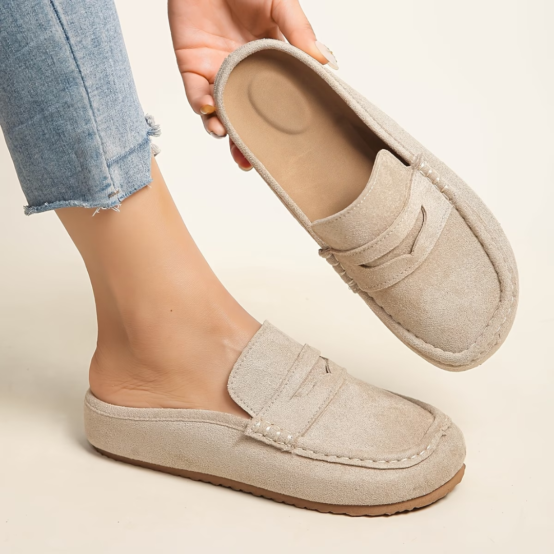 Women's stylish slip-on loafers in black, perfect for everyday comfort & versatile casual chic fashion.