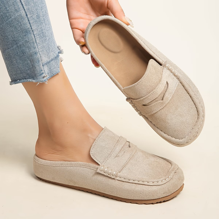 Women's stylish slip-on loafers in black, perfect for everyday comfort & versatile casual chic fashion.