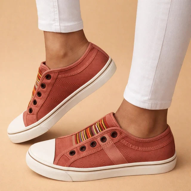 Comfortable women's slip-on sneakers with breathable mesh, ideal for casual wear, walking & everyday style.