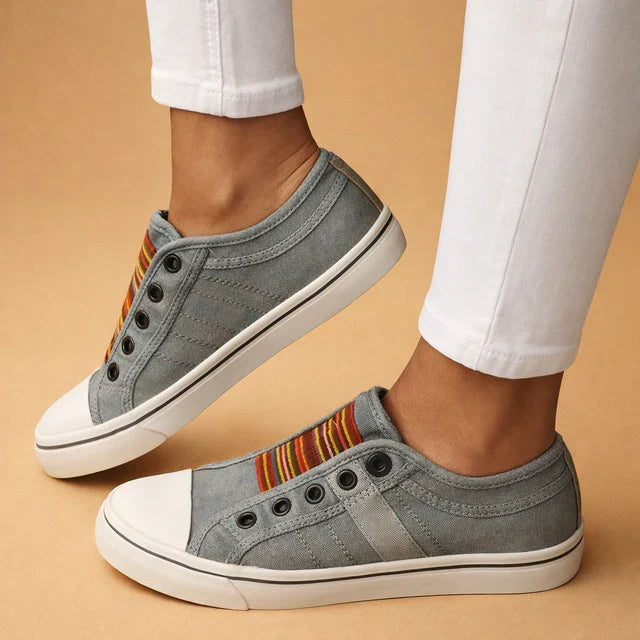Trendy women's slip-on sneakers, great for casual outings, offering comfort & easy wear for spring/summer.