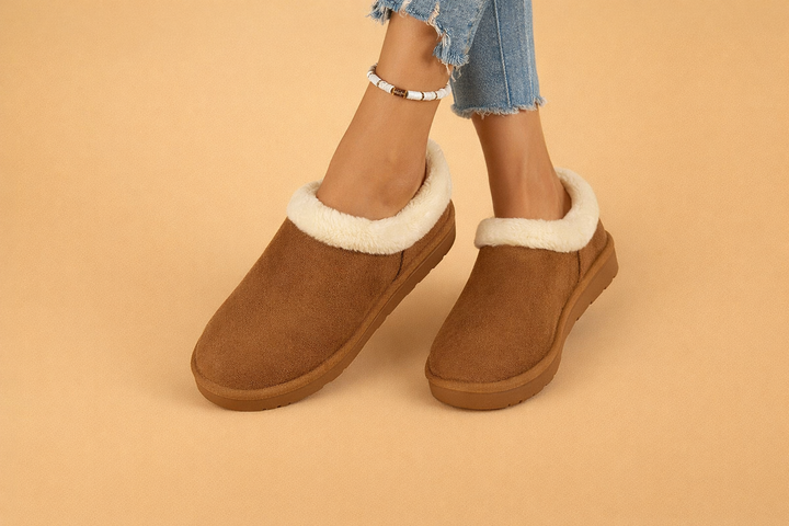 Women's stylish ankle snow boots, slip-on design provides a snug, warm fit for winter activities.
