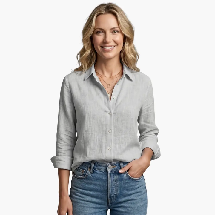 Blue slubbed texture long sleeve blouse for women. Versatile button-up collared top, perfect for casual style.