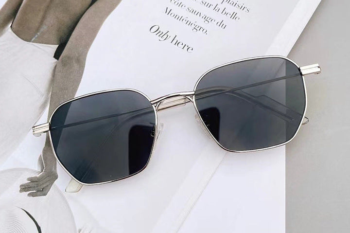 Daily wear women's square sunglasses. Stylish metal frame design for comfort and sun protection.