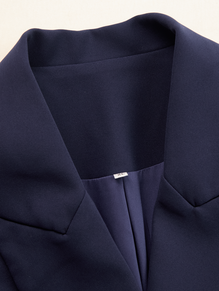 Modern women's blazer dress with V-neck, tailored for a flattering and stylish fit.