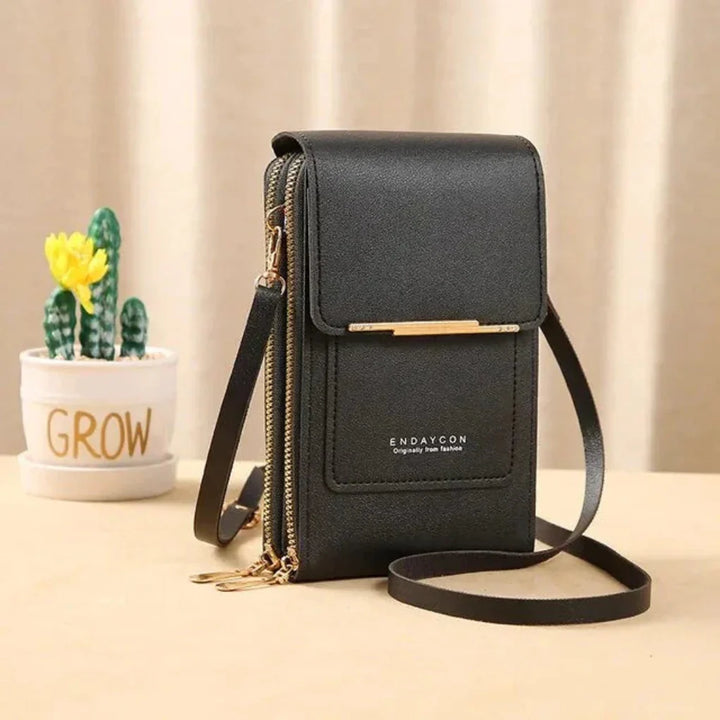 Women's stylish touch screen crossbody shoulder bag for everyday use & travel. Secure phone access.