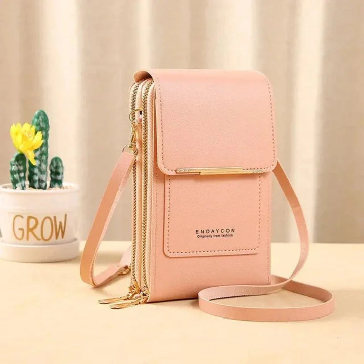 Travel-friendly women's touch screen shoulder bag. Crossbody anti-theft design keeps your phone & valuables safe.