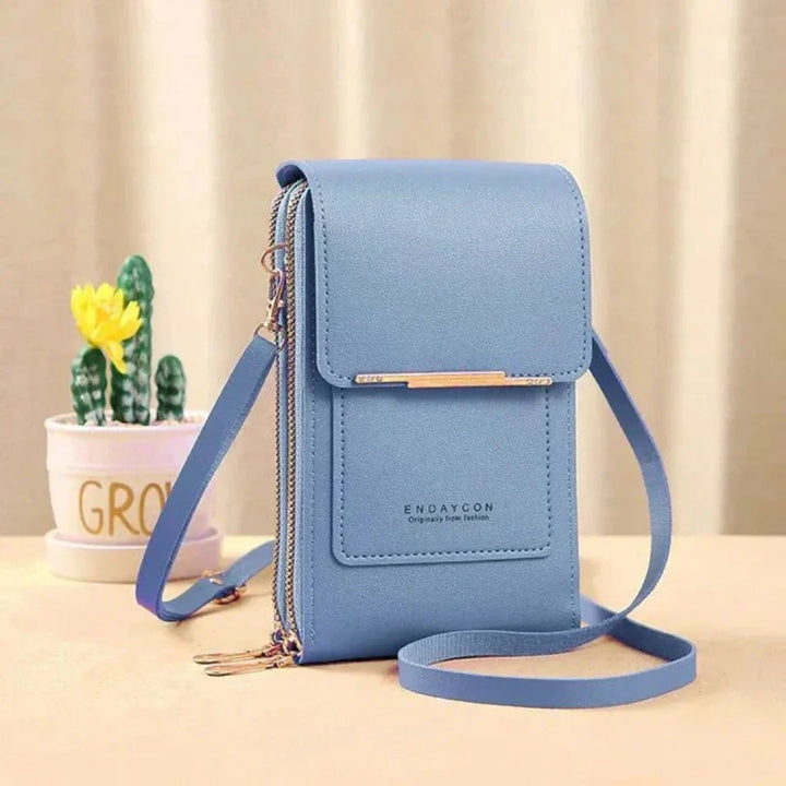 Practical women's touch screen shoulder bag. Keep your phone secure & accessible in this stylish crossbody.