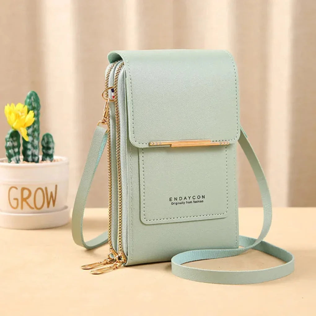 Modern women's touch screen crossbody bag. Ideal for daily essentials, offering smart phone interaction on the go.