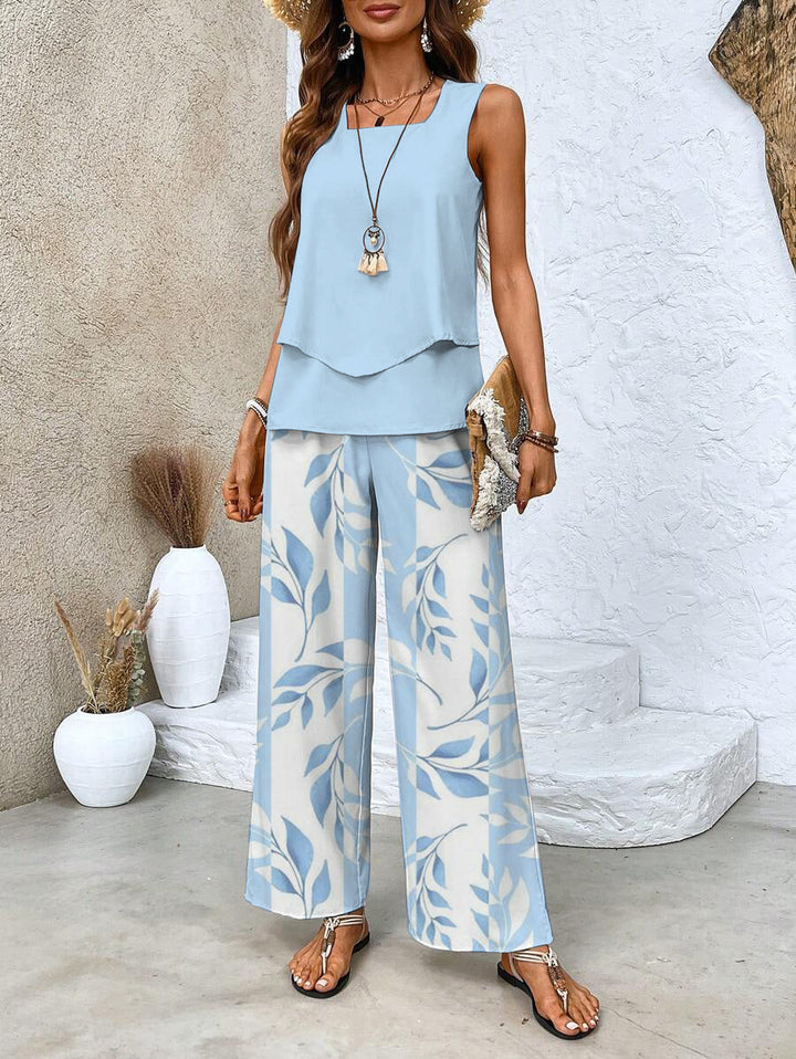 Women's stylish two-piece set with sleeveless top & wide leg printed trousers, perfect for summer casual wear.