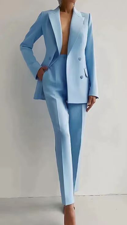 Stylish women's two-piece suit set. Features casual trousers, a matching top, & a comfortable tailored fit.