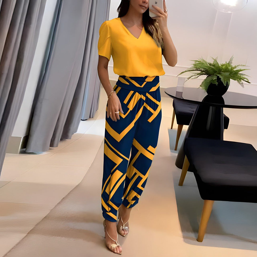 Women's stylish V-neck printed two-piece set, perfect for casual or elegant outfits.