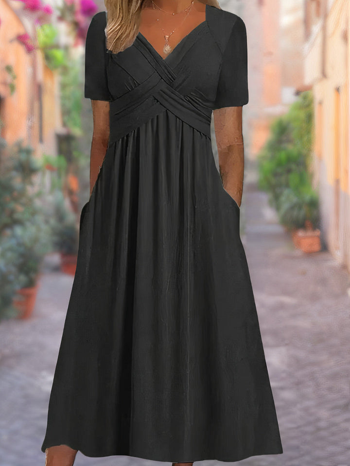 New women's short V-neck dress with a relaxed fit, great for comfortable summer casual outfits.