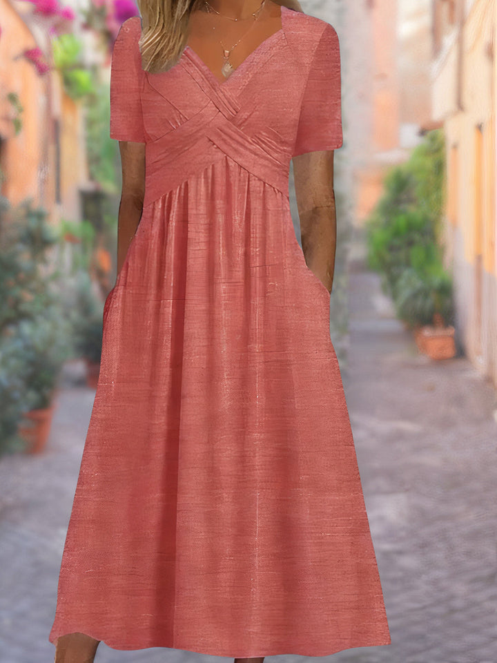Elegant V-neck summer dress for women, a versatile piece for stylish beachwear & everyday fashion.