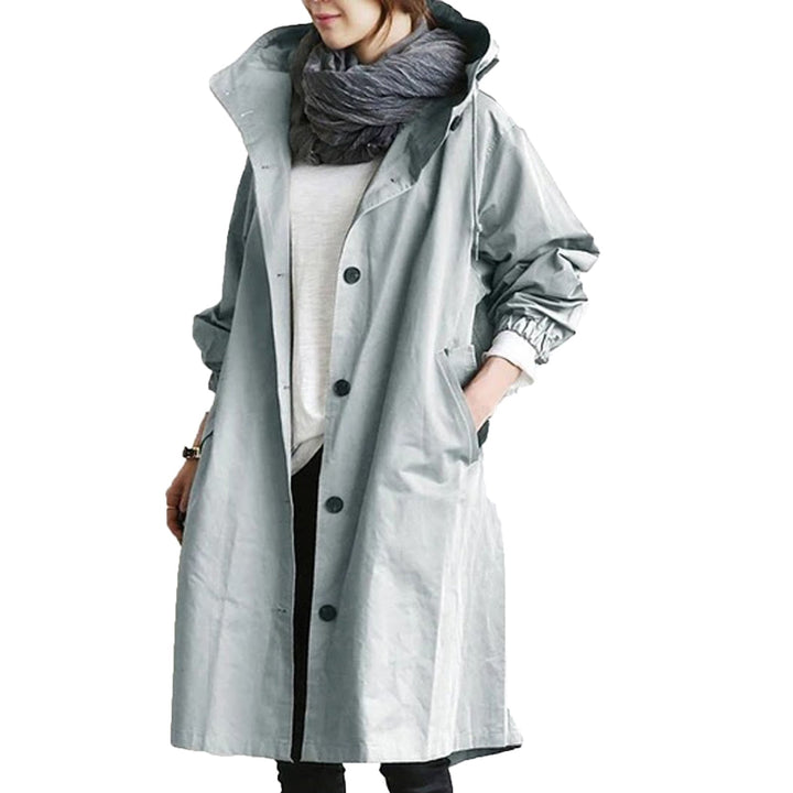 Long waterproof rain jacket for women, offering excellent weather protection. Ideal spring & summer hooded outerwear.