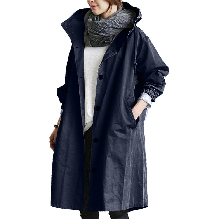 Modern women's long rain jacket, designed for ultimate weather protection. Fashionable & practical waterproof coat.