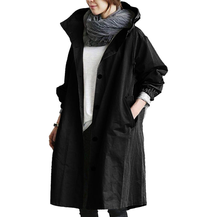 Waterproof long rain jacket for women, a stylish solution for wet weather. Perfect spring/summer outdoor apparel.