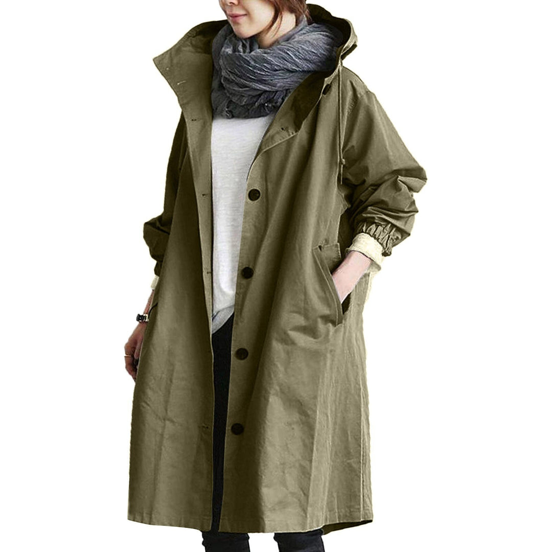 Fashionable women's long hooded raincoat, ensuring superior weather protection & style. Essential outdoor apparel.