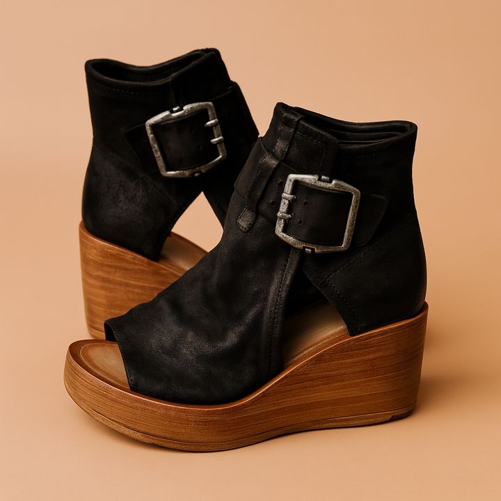 Women's stylish wedge sandals with a bold buckle detail, perfect for summer fashion and chic evening wear.