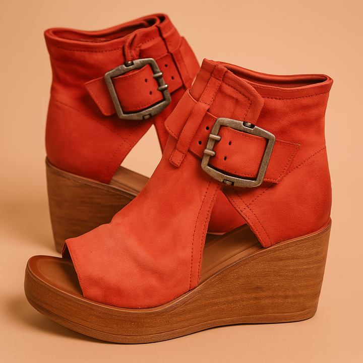Fashionable women's wedge sandals with a unique bold buckle, offering a trendy and comfortable shoe option.