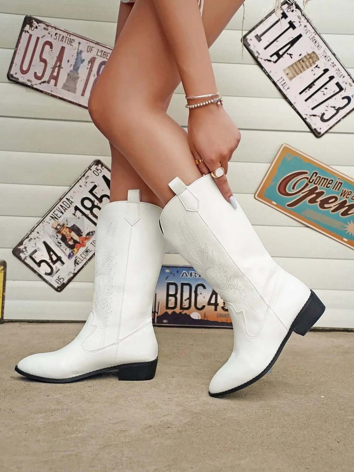 Women's stylish Western boots, classic cowboy look with modern fashion appeal.