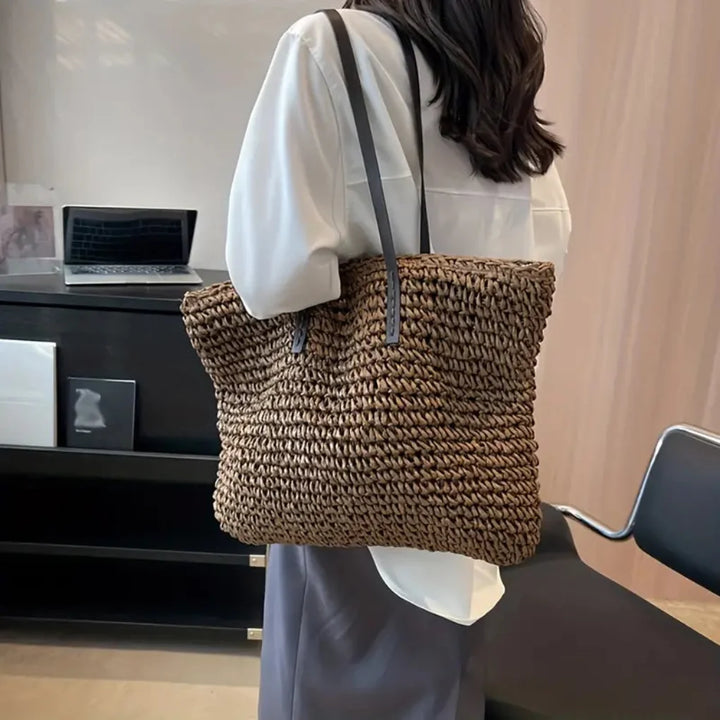 Chic women's woven tote bag for daily use. A versatile shoulder bag in neutral tones.