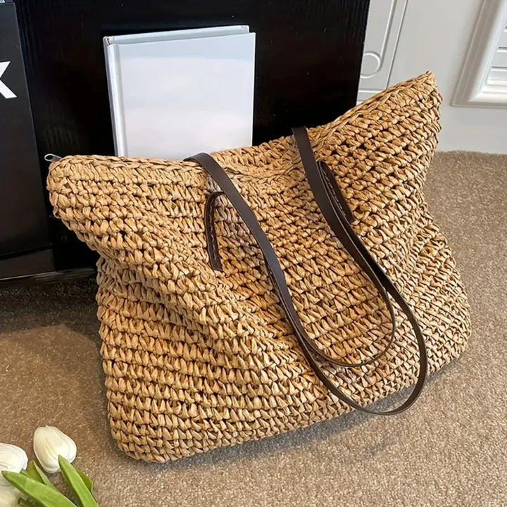 Fashionable women's woven tote in neutral colors. Stylish carry-all and daily shoulder bag.