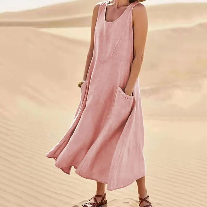 Women's summer U-neck maxi dress with pockets, loose fit bohemian style for casual everyday wear.